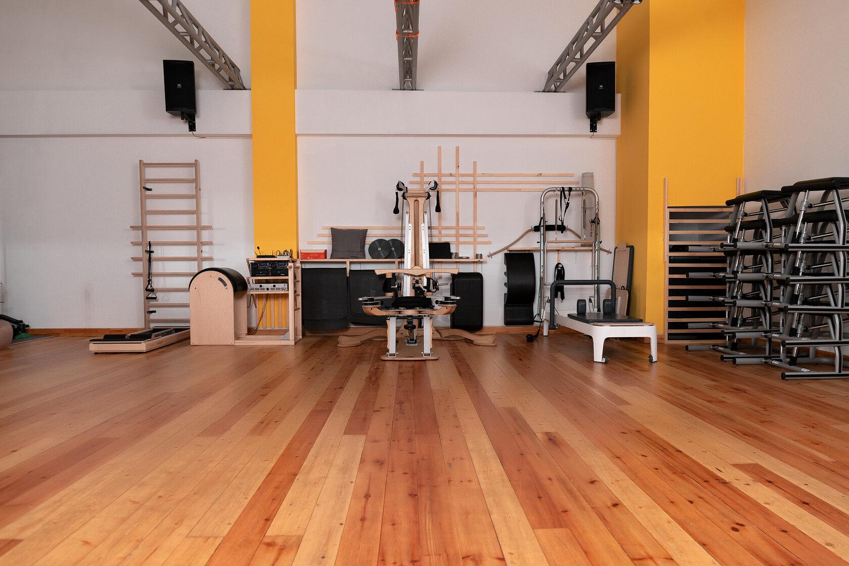 First Pilates Studio: a bright training hall with equipment